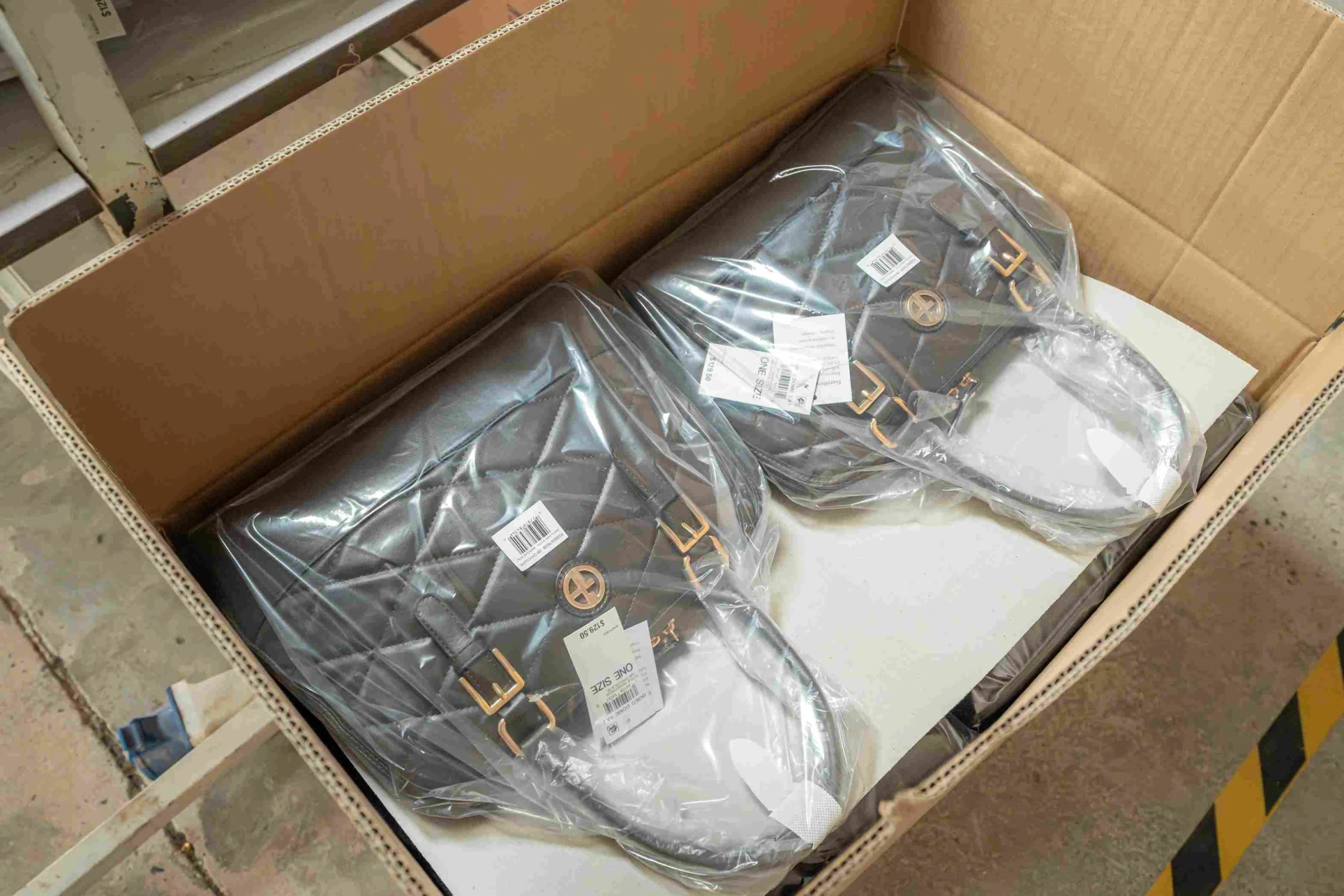 Finished handbags packed in boxes